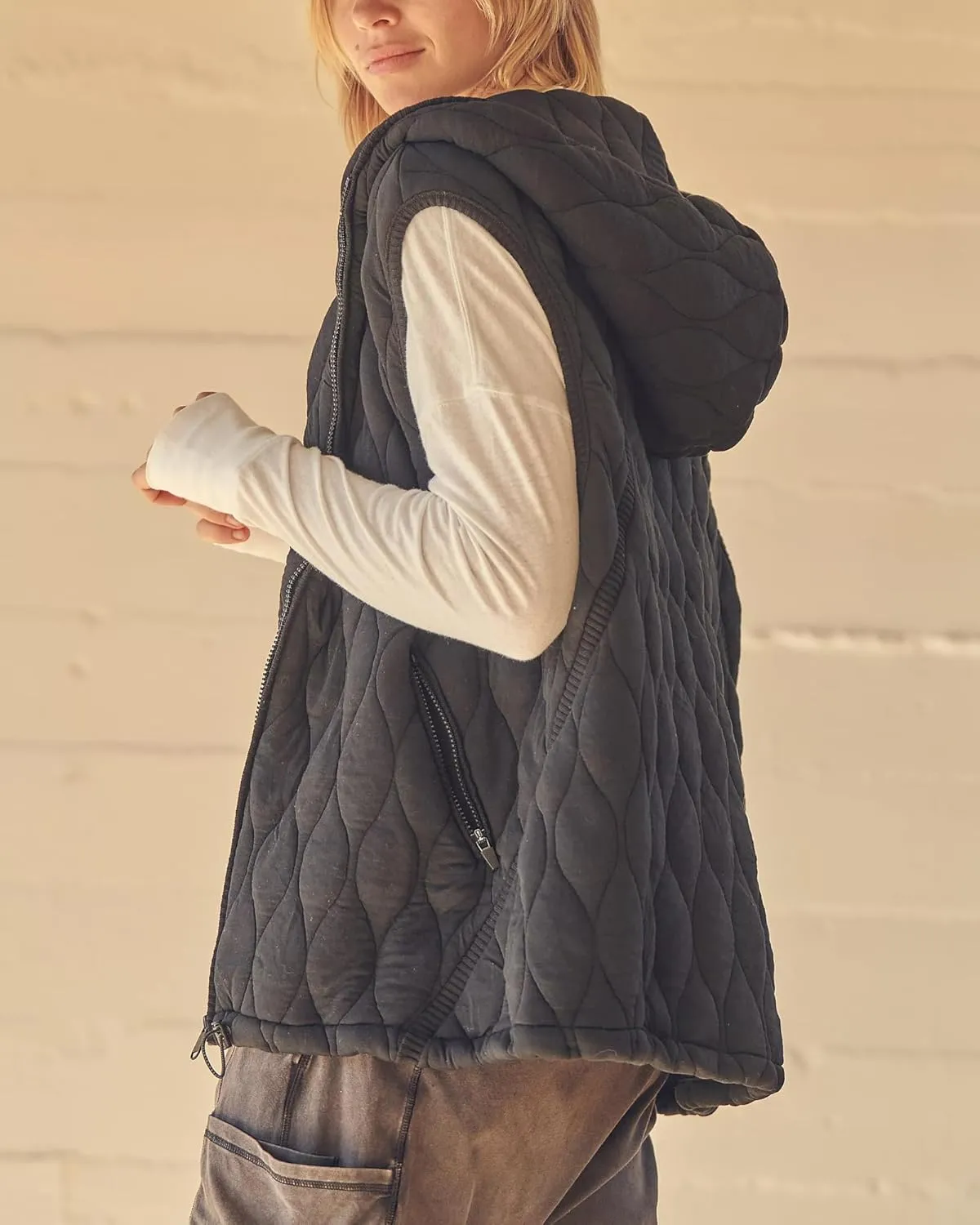 Gacaky Womens Oversized Puffer Vest Casual Sleeveless Quilted Jacket Zip Up Hoodie Pockets Warm Winter Coat Outerwear