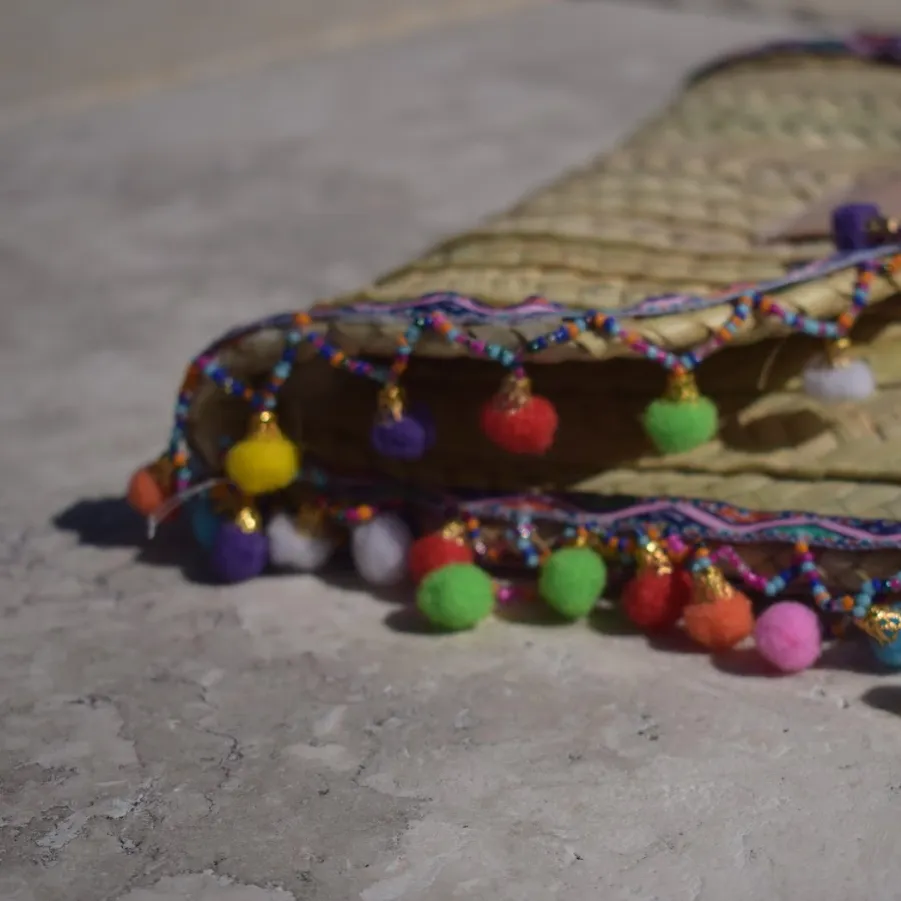 Penelope Multicolor Pom Pom Trim Straw Clutch